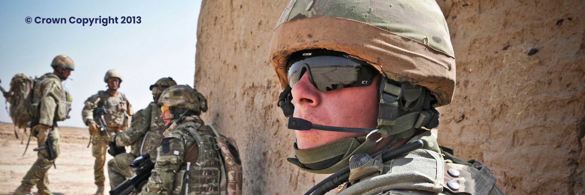 A soldier in a desert environment, Crown Copyright 2013